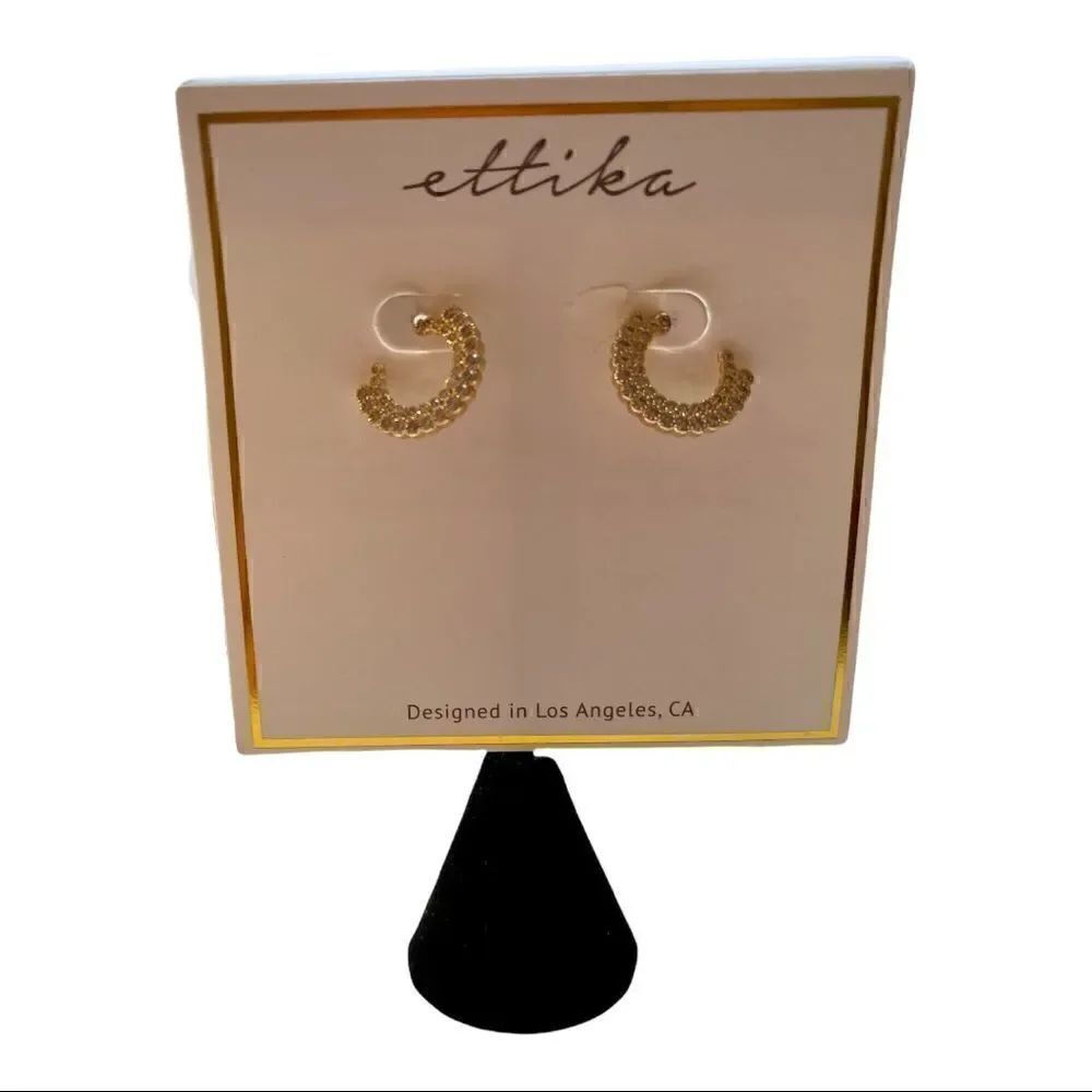 ettika mini gold toned hoops with beautiful cubic zirconia stones.
